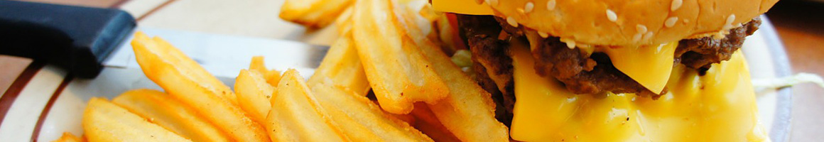 Eating Burger at Cheeseburger Bobby's restaurant in Marietta, GA.